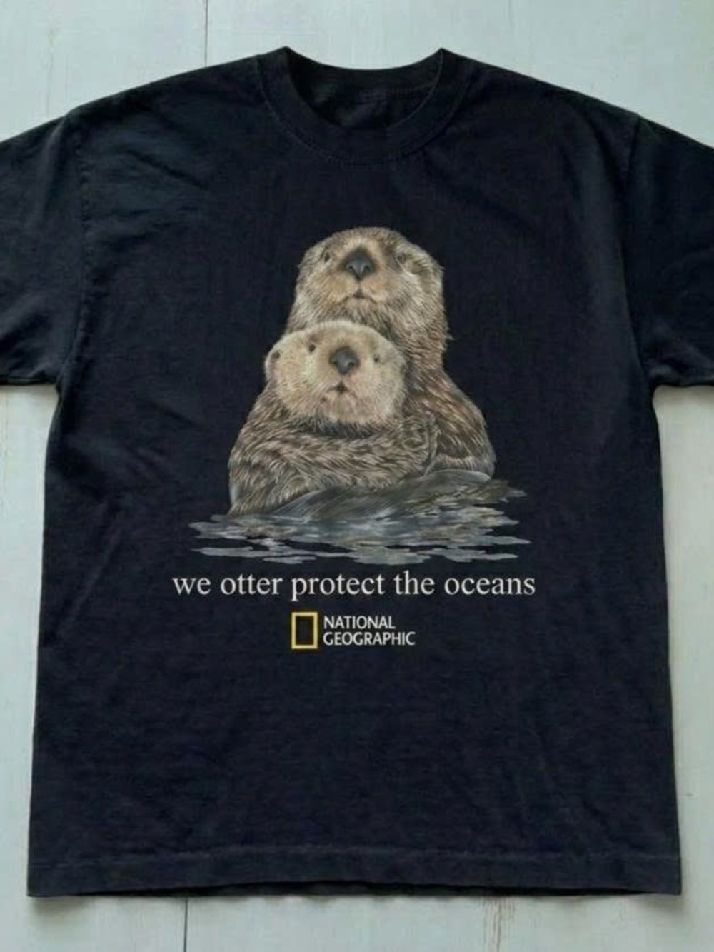 Black T-Shirt with Otter Illustration